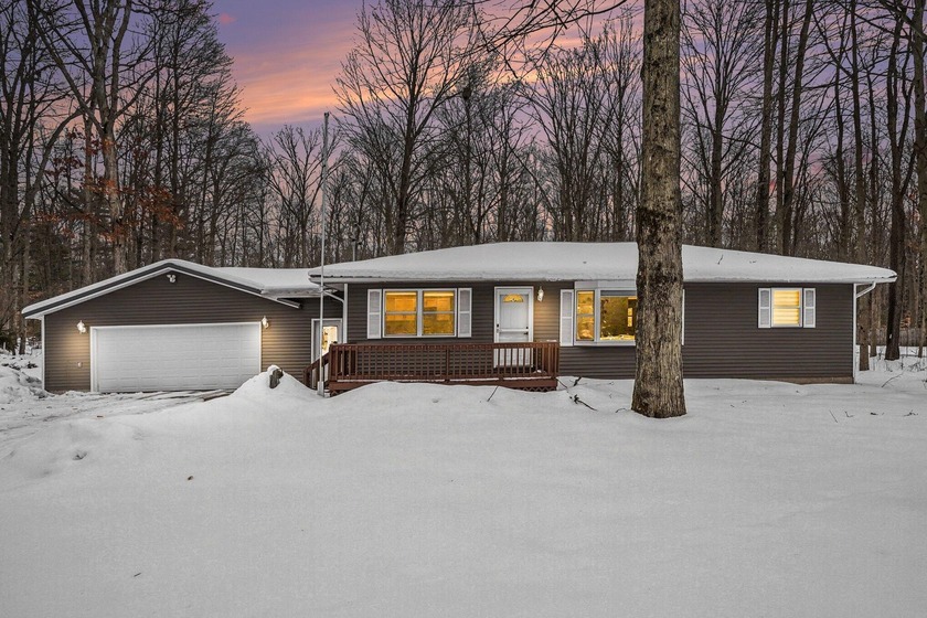 Come and check out this beautifully updated home on 5 wooded - Beach Home for sale in Spring Lake, Michigan on Beachhouse.com