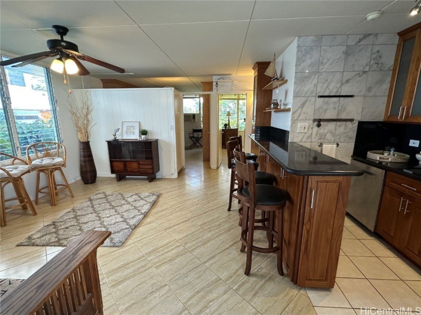 Welcome home to Diamond Head Surf, a gem in the coveted Pualei - Beach Condo for sale in Honolulu, Hawaii on Beachhouse.com