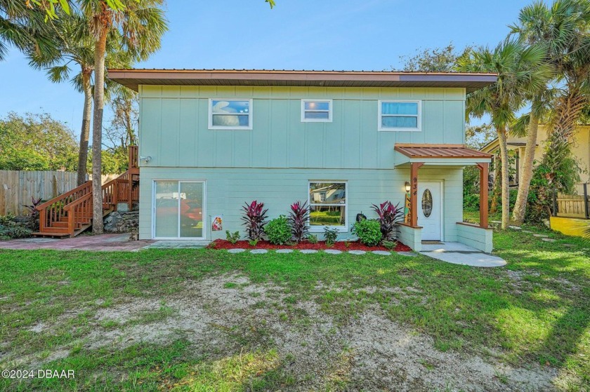 Discover this stunning two-story beachside home, thoughtfully - Beach Home for sale in Daytona Beach, Florida on Beachhouse.com