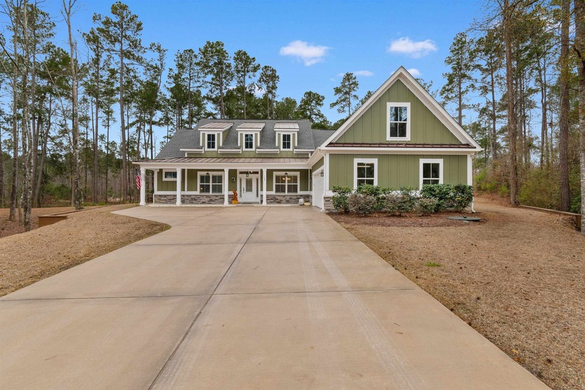 Rare find in Myrtle Beach! This custom-built sanctuary sits on a - Beach Home for sale in Myrtle Beach, South Carolina on Beachhouse.com