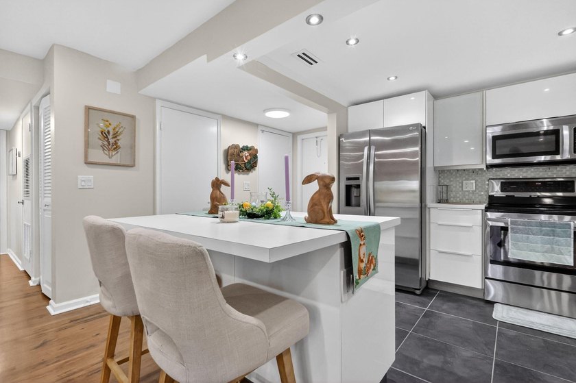 Tastefully upgraded condo featuring an open floor plan with 2 - Beach Condo for sale in Lantana, Florida on Beachhouse.com