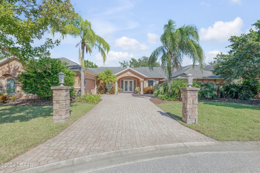 Welcome to this stunning ICI custom-built home situated on a - Beach Home for sale in Ormond Beach, Florida on Beachhouse.com