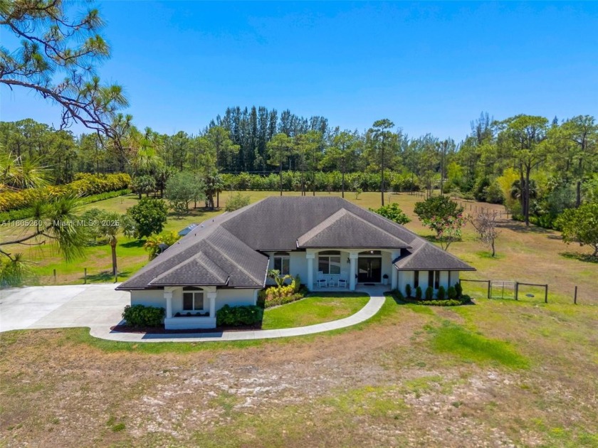 Experience the equestrian lifestyle on 5 pristine acres in - Beach Home for sale in Palm Beach Gardens, Florida on Beachhouse.com