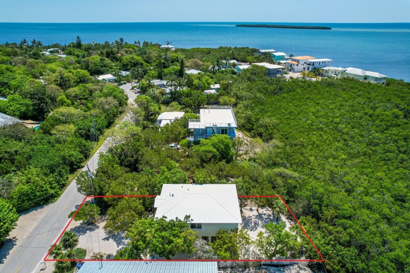 Introducing the Sunflower Hideaway - a stunning 3 bedroom, 2 - Beach Home for sale in Key Largo, Florida on Beachhouse.com