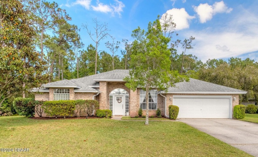 Welcome to this exquisite home nestled in the prestigious Hunt - Beach Home for sale in Ormond Beach, Florida on Beachhouse.com