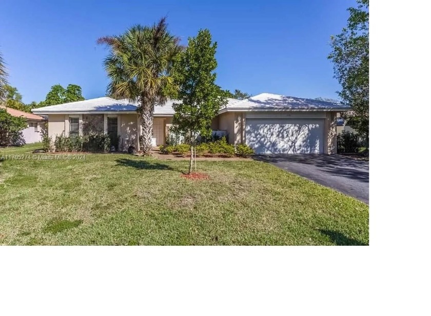 Beautiful 3 bedroom 2.5 bathroom pool home in the charming - Beach Home for sale in Coral Springs, Florida on Beachhouse.com