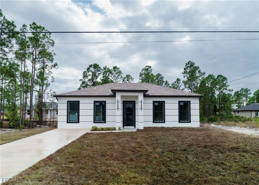 New construction home featuring a private mother-in-law suite - Beach Home for sale in Lehigh Acres, Florida on Beachhouse.com
