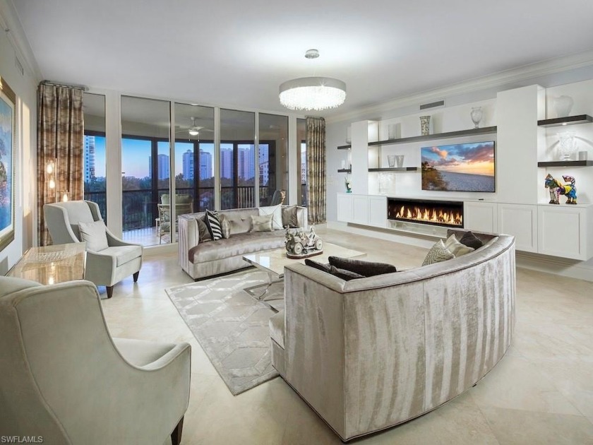 Dramatic sunsets glisten through the sparkling high-rises from - Beach Home for sale in Naples, Florida on Beachhouse.com
