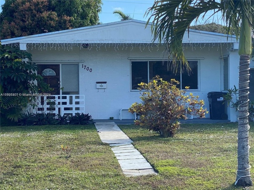 Big corner lot. Custom home with large bedrooms and one with a - Beach Home for sale in North Miami Beach, Florida on Beachhouse.com