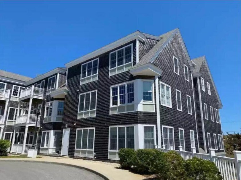 Welcome to the epitome of sophisticated living. This - Beach Condo for sale in Provincetown, Massachusetts on Beachhouse.com