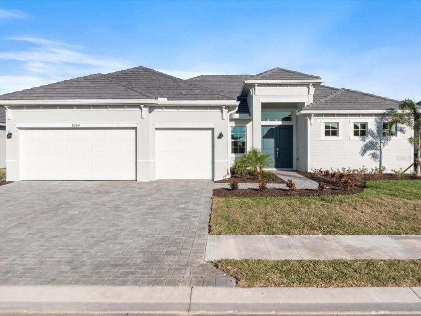 This amazing, brand new, never occupied 3-bed, 3 full bath, plus - Beach Home for sale in Englewood, Florida on Beachhouse.com