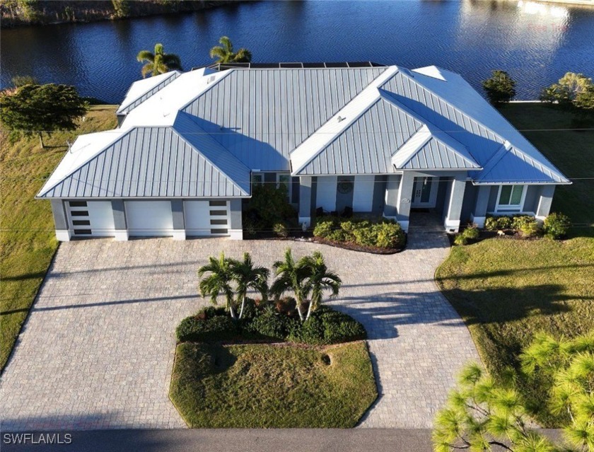 This stunning custom built home has a modern open design with - Beach Home for sale in Cape Coral, Florida on Beachhouse.com