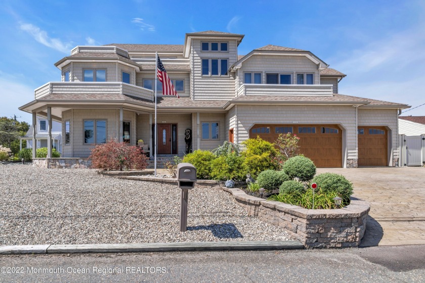 This magnificent waterfront home offers sweeping views of the - Beach Home for sale in Forked River, New Jersey on Beachhouse.com