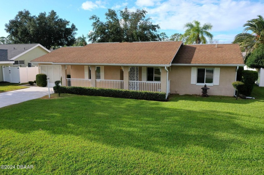 Fantastic location in Pine Lakes, just steps from the Pine Lakes - Beach Home for sale in Palm Coast, Florida on Beachhouse.com