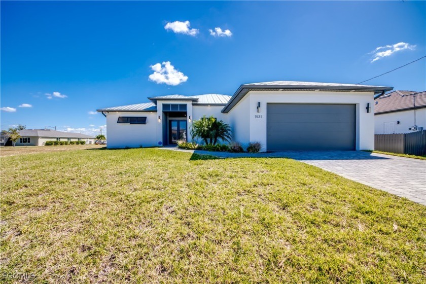 Discover modern coastal living in this new construction - Beach Home for sale in Cape Coral, Florida on Beachhouse.com