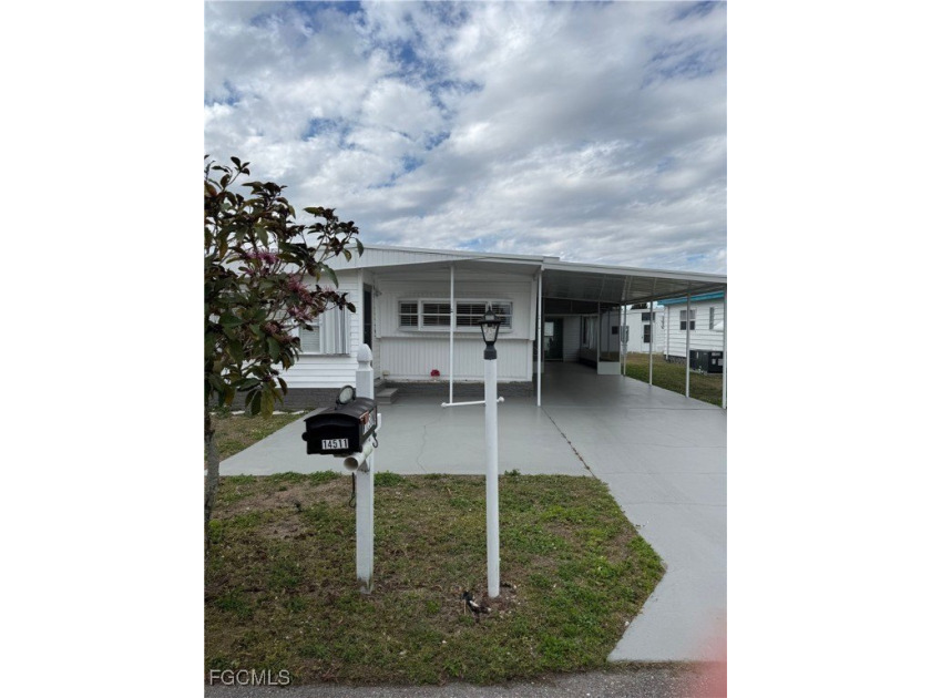 Welcome to 14511 Constitution Way, located in a sought-after 55+ - Beach Home for sale in North Fort Myers, Florida on Beachhouse.com