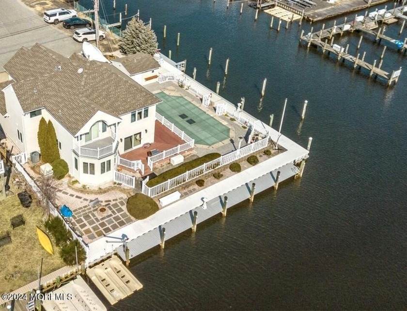 Welcome to this luxurious Boat House with 190' of vinyl bulkhead - Beach Home for sale in Brick, New Jersey on Beachhouse.com