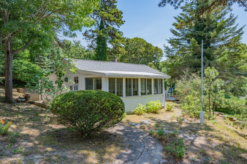 Discover the timeless Cape Cod lifestyle at this classic - Beach Home for sale in South Dennis, Massachusetts on Beachhouse.com