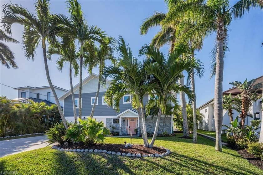Enjoy coastal living in this stylish 3-bedroom+, 3-bath elevated - Beach Home for sale in Bonita Springs, Florida on Beachhouse.com