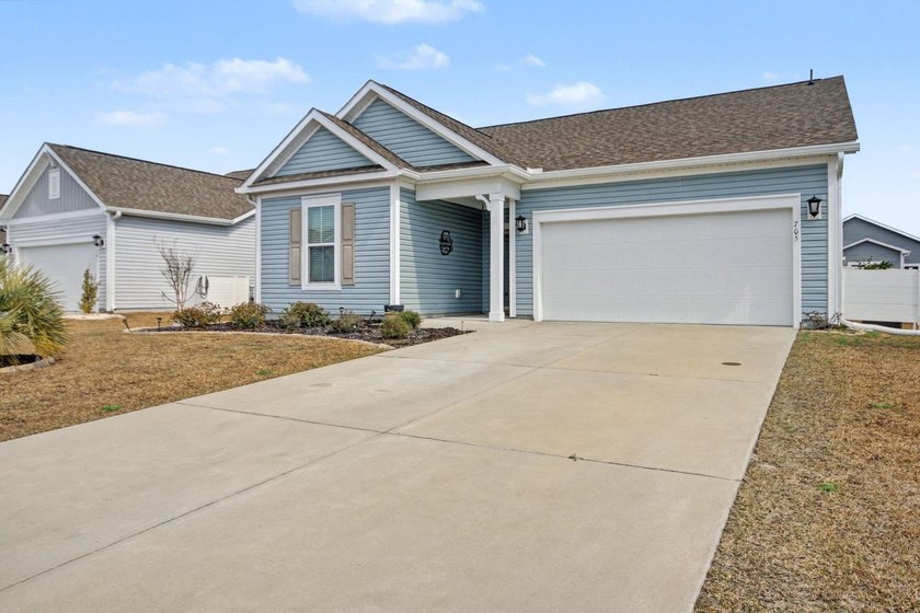 Built in 2022, this move-in-ready Georgetown plan offers easy - Beach Home for sale in Little River, South Carolina on Beachhouse.com