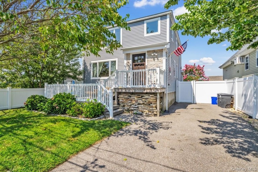 Welcome to your boater's dream home! This beautiful Babylon - Beach Home for sale in Babylon, New York on Beachhouse.com