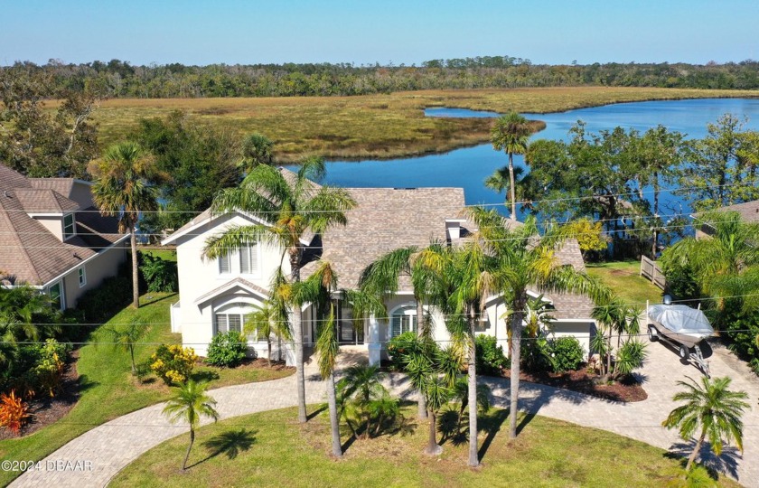 Nestled in the historic Tomoka Oaks neighborhood, this beautiful - Beach Home for sale in Ormond Beach, Florida on Beachhouse.com