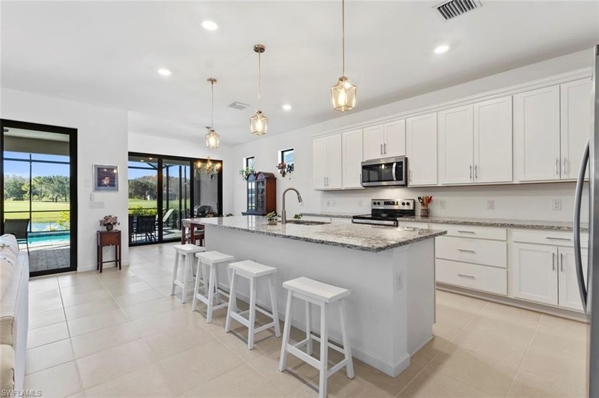 THIS HOME CHECKS OFF THE BOXES - POOL, GOLF COURSE AND WATER - Beach Home for sale in Ave Maria, Florida on Beachhouse.com