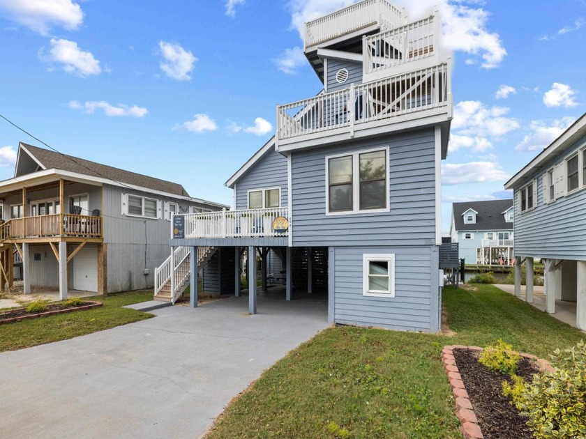 Stunning 4-Bedroom, 2-Bath Waterfront Home with Pool, Just Steps - Beach Home for sale in North Myrtle Beach, South Carolina on Beachhouse.com