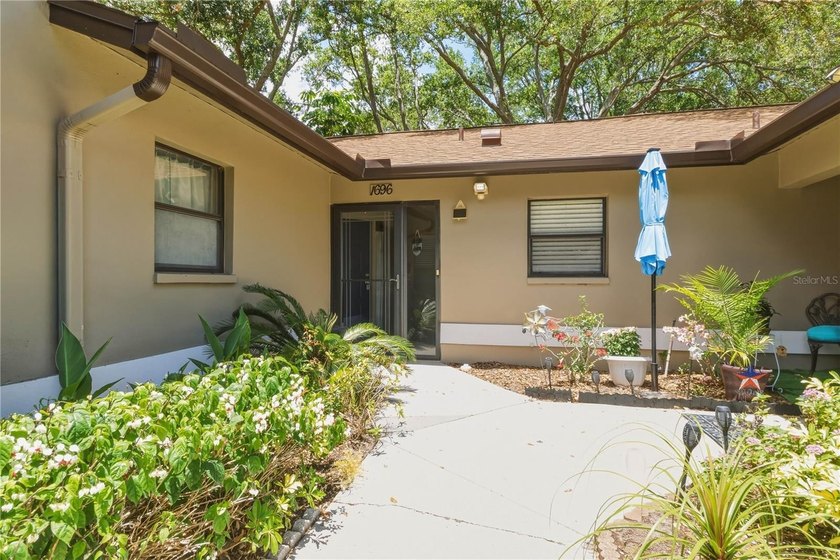 Stunning VILLA located in highly desirable Braemoor Village in - Beach Home for sale in Dunedin, Florida on Beachhouse.com