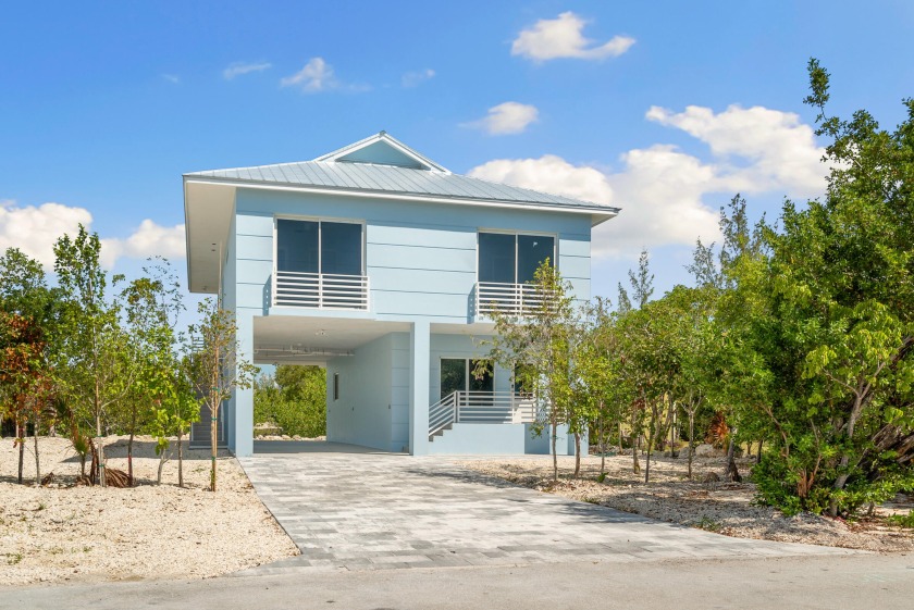 Stunning new construction 4 bedroom, 3 bath home in highly - Beach Home for sale in Plantation Key, Florida on Beachhouse.com