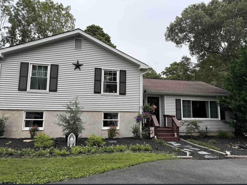 Welcome to this well-maintained 3-bedroom, 2-bath home set on a - Beach Home for sale in Galloway, New Jersey on Beachhouse.com