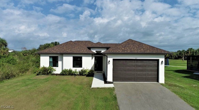 Sunny and modern, this 3-bedroom, 2-bath plus den home boasts a - Beach Home for sale in Naples, Florida on Beachhouse.com