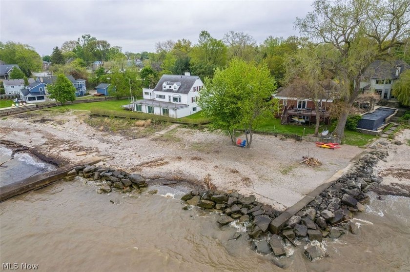 Rare opportunity to own a stunning lakefront brick ranch nestled - Beach Home for sale in Vermilion, Ohio on Beachhouse.com