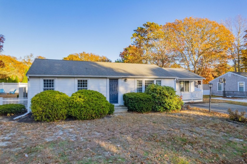 Experience the epitome of coastal living with this charming Cape - Beach Home for sale in Harwich Port, Massachusetts on Beachhouse.com