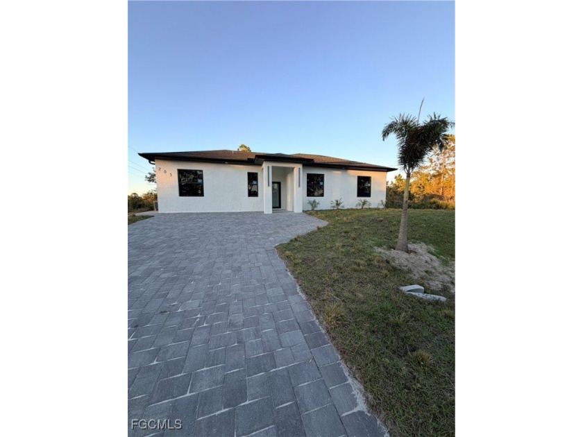 Beautiful brand-new construction offering luxury finishes at an - Beach Home for sale in Lehigh Acres, Florida on Beachhouse.com