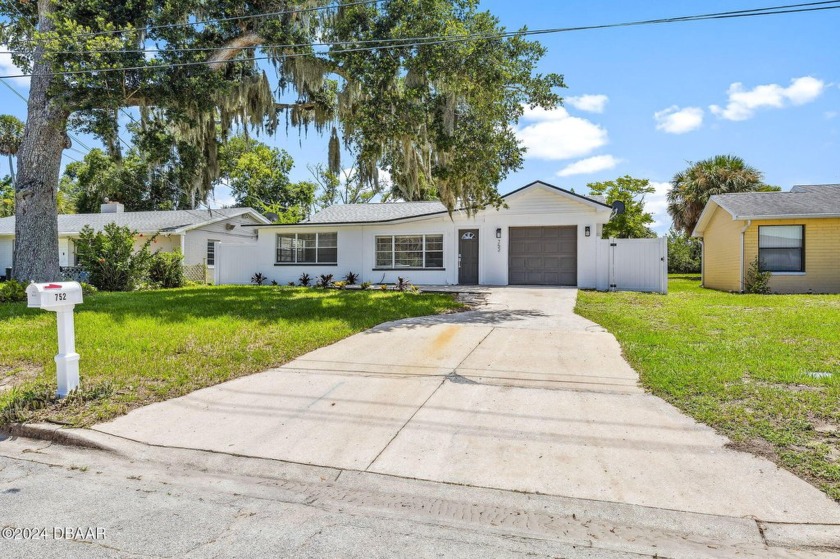 Welcome to this beautifully upgraded 4-bedroom, 1.5-bath home in - Beach Home for sale in Daytona Beach, Florida on Beachhouse.com