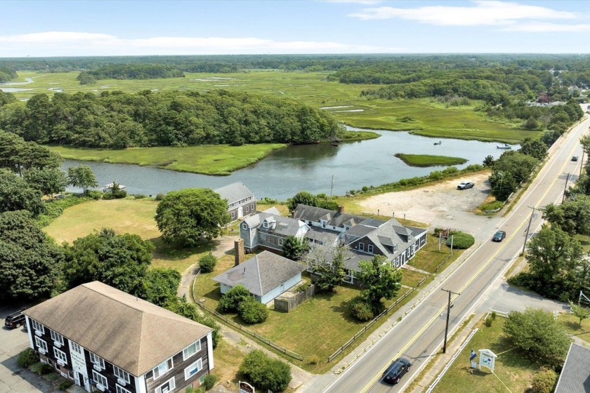 Private Waterfront Compound for sale! The property is situated - Beach Home for sale in West Harwich, Massachusetts on Beachhouse.com