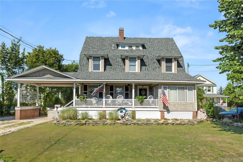 Waterfront Victorian Estate with Deep Water Dockage Set on a - Beach Home for sale in Bay Shore, New York on Beachhouse.com