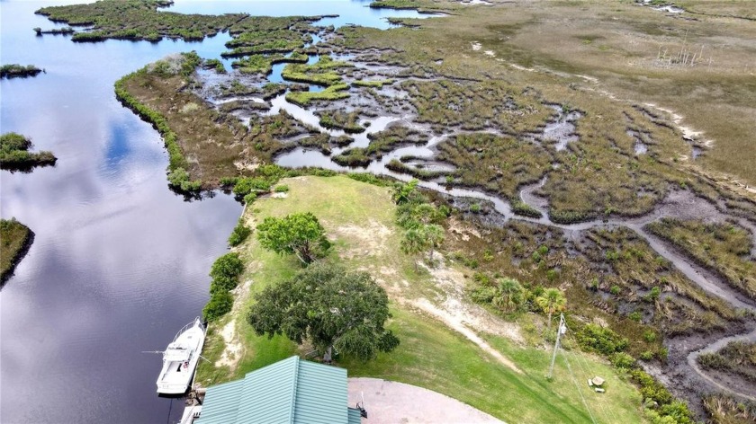 Discover the perfect waterfront retreat in Aripeka with this - Beach Lot for sale in Spring Hill, Florida on Beachhouse.com