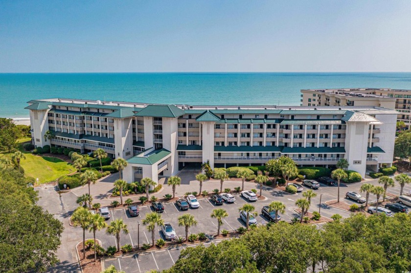This fully renovated fourth-floor, oceanfront gem features - Beach Condo for sale in Pawleys Island, South Carolina on Beachhouse.com