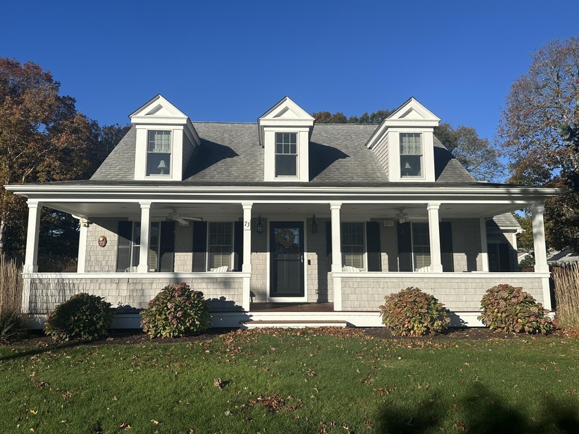 This lovely Nantucket style home is in an ideal location .5 - Beach Home for sale in West Yarmouth, Massachusetts on Beachhouse.com