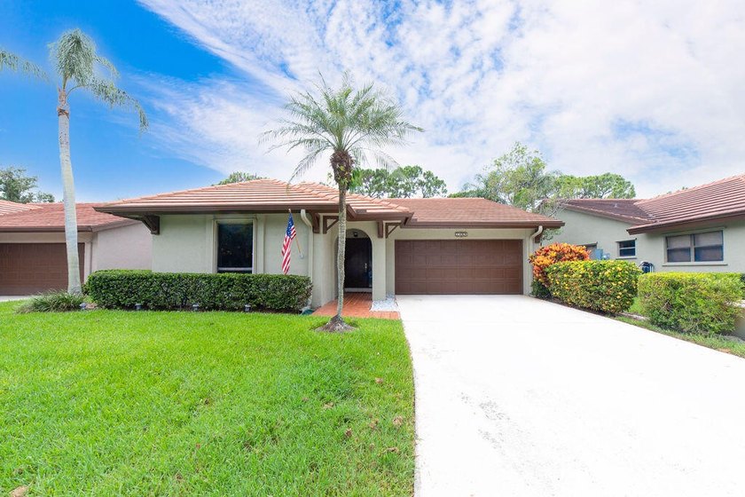 This beautiful 2/2/2 sitting on the 5th hole of the Golf Course - Beach Home for sale in Palm City, Florida on Beachhouse.com