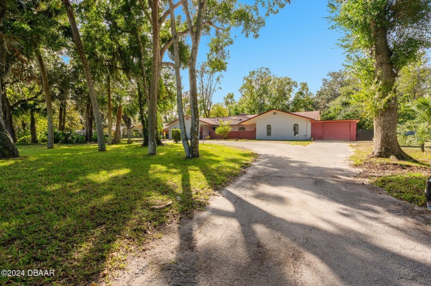 Updated family oasis- This home features 4 bedrooms and 3 full - Beach Home for sale in Edgewater, Florida on Beachhouse.com