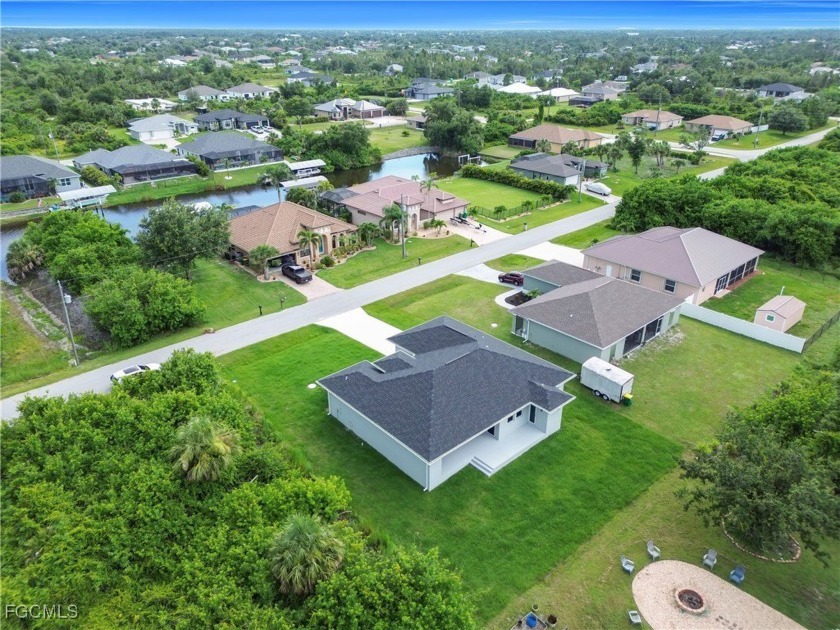 This freshly built single-story home features an open layout - Beach Home for sale in Port Charlotte, Florida on Beachhouse.com