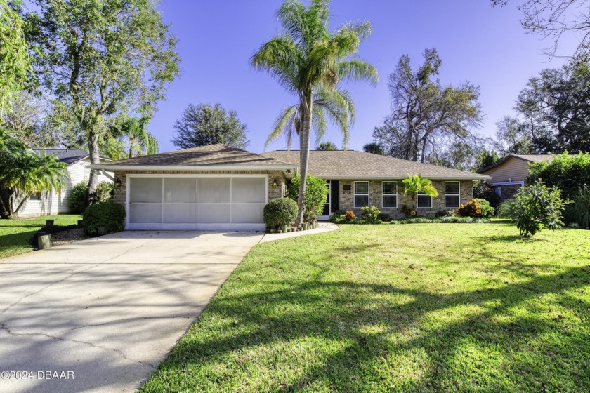 Tucked away on a quiet, established street sits this - Beach Home for sale in Ormond Beach, Florida on Beachhouse.com