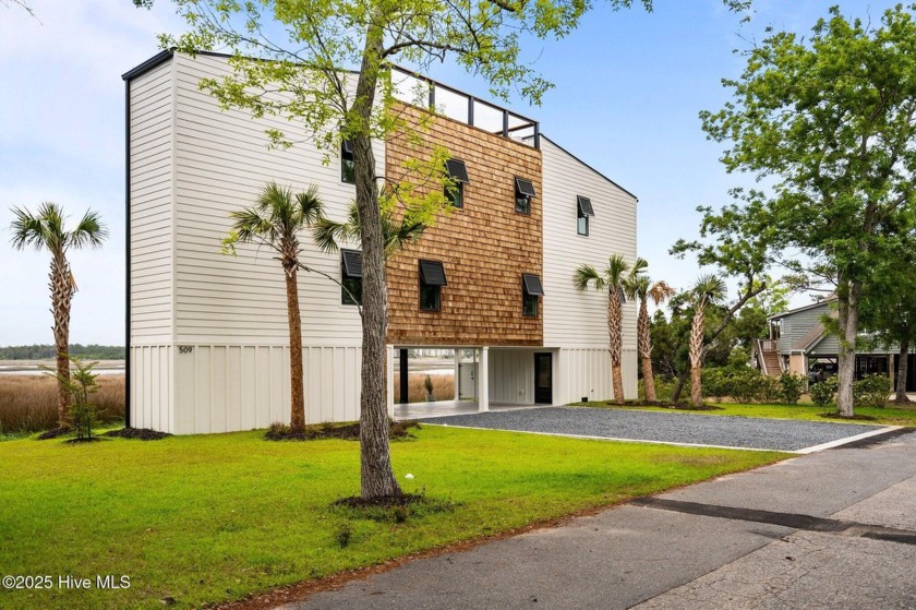 Luxury Coastal Living at Its Finest - Custom Home by Silvers - Beach Home for sale in Oak Island, North Carolina on Beachhouse.com