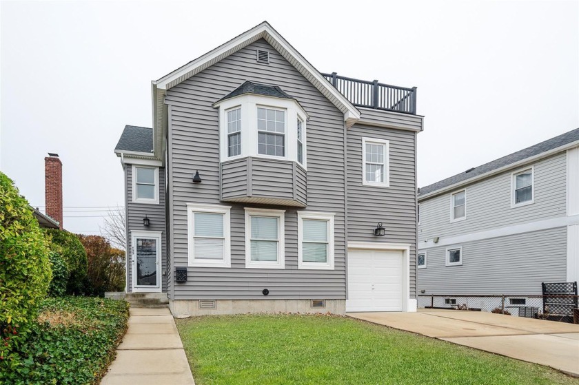 Discover the perfect blend of coastal charm and modern living in - Beach Townhome/Townhouse for sale in Long Beach, New York on Beachhouse.com