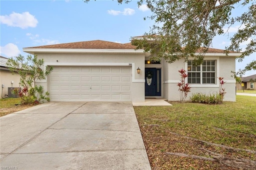 This stunning 3-bedroom, 2-bathroom home offers the perfect - Beach Home for sale in Lehigh Acres, Florida on Beachhouse.com