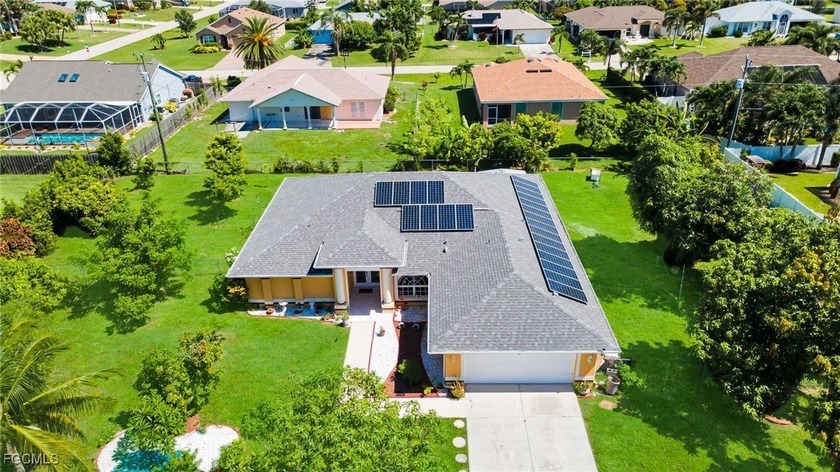 Discover this spacious 4-bedroom, 3-bath home located in the - Beach Home for sale in Cape Coral, Florida on Beachhouse.com