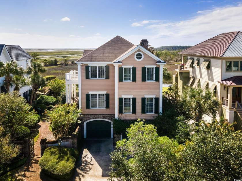 Enjoy classic Lowcountry living in this custom home, overlooking - Beach Home for sale in Georgetown, South Carolina on Beachhouse.com